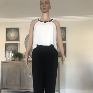 Trina Turk black and white jumpsuit.  NWOT.  Sz 4